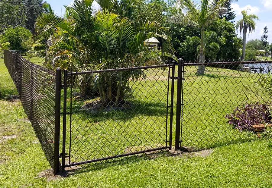 Wide chain link fence gate.