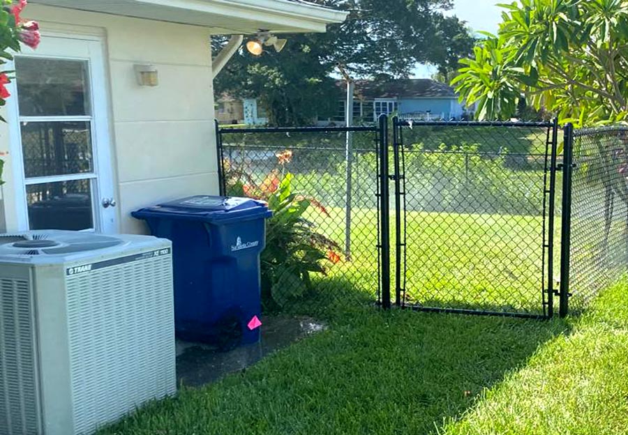 Black chain link fence gate.